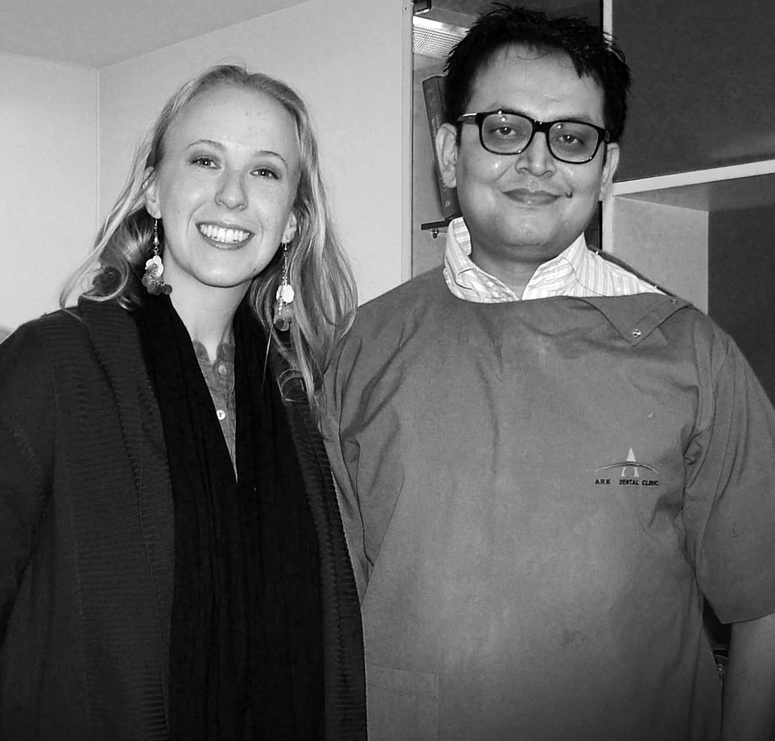 Dr. Ameet S. Dixit with an international patient at Ark Dental Clinic
