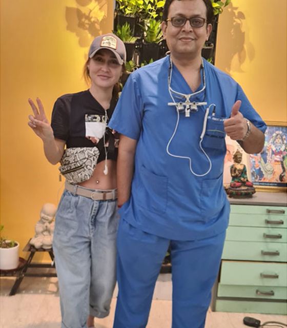 Thumbs up after treatment at Ark Dental Global, Greater Kailash 1