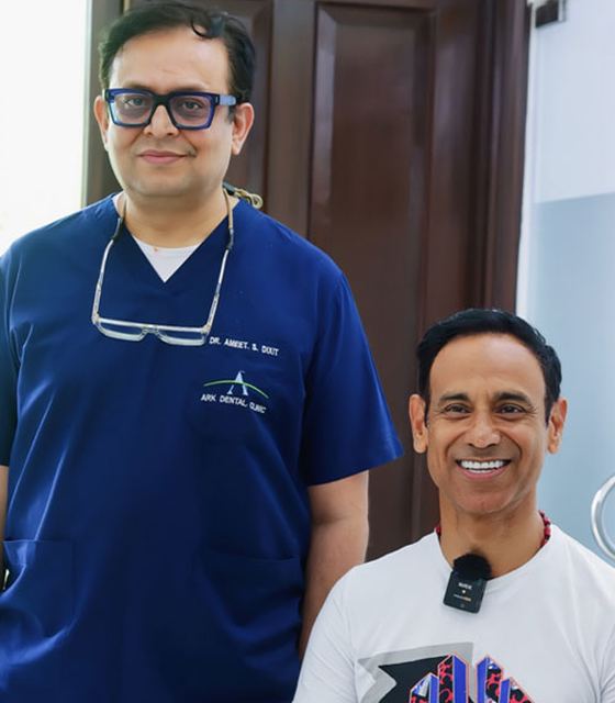 Thumbs up after treatment at Ark Dental Global, Greater Kailash 1